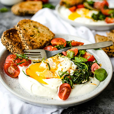 Turkish Eggs in Greek Yogurt & Sautéed Spinach | U.S. Dairy